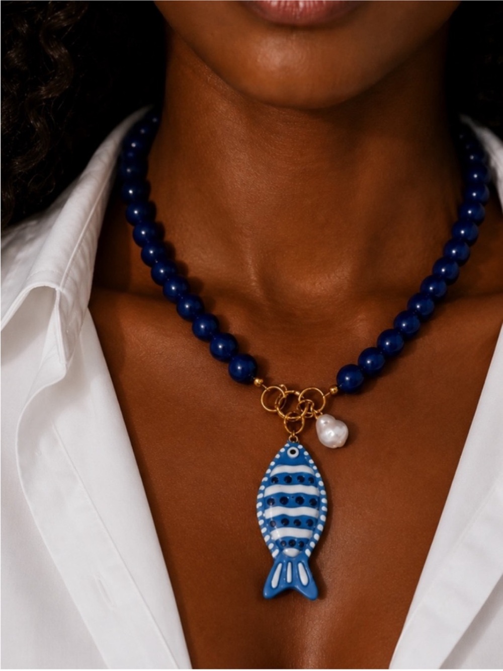 Coastal Dopamine Blue Beaded Necklace with Striped Fish Pendant